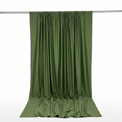 Olive green satin curtain draped on a rod against a white background