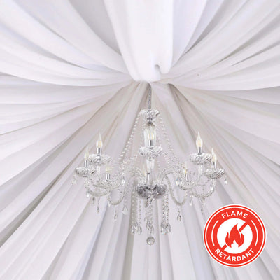 Elegant crystal chandelier with hanging crystals and candle-style lights.