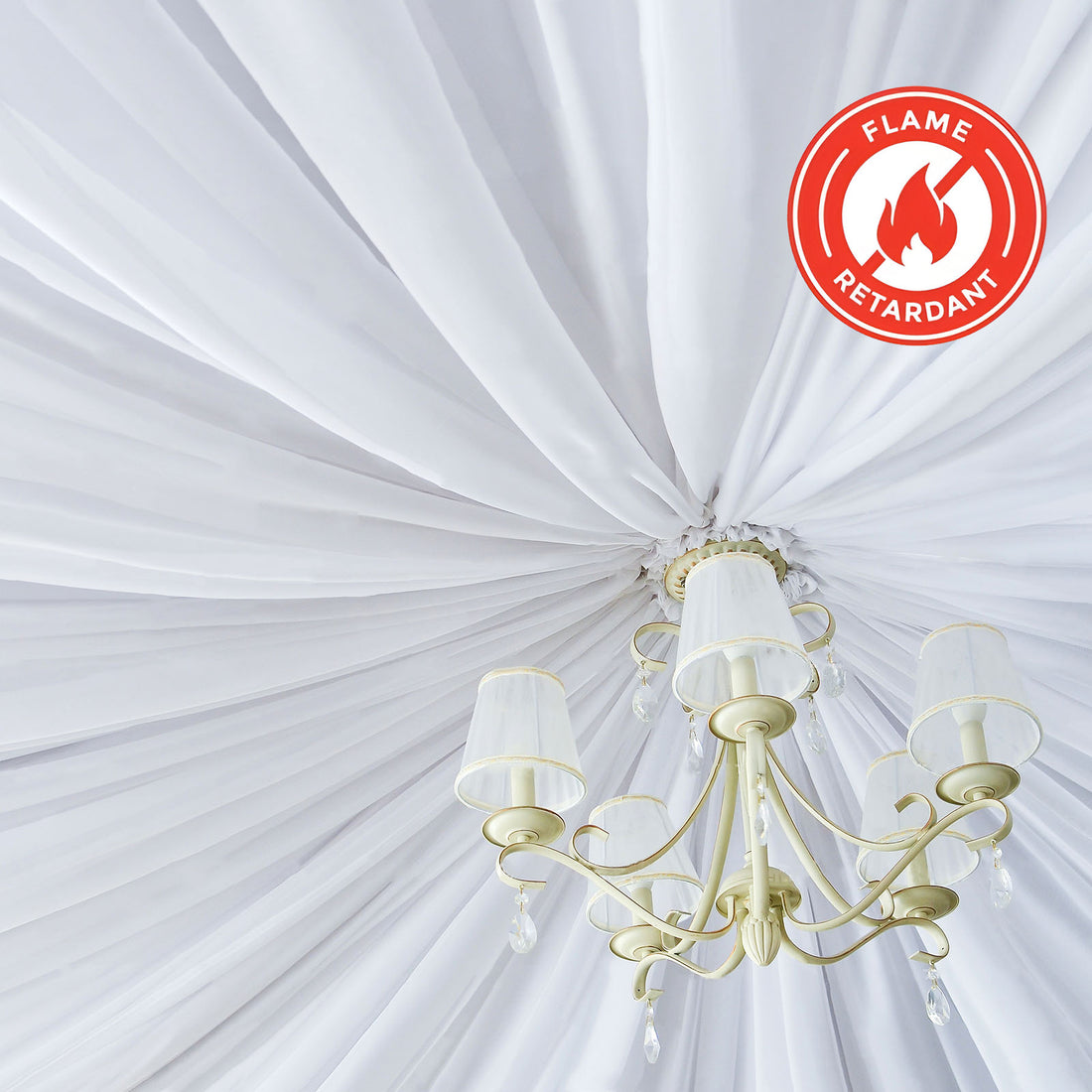 Flame retardant white drapery with chandelier overhead
