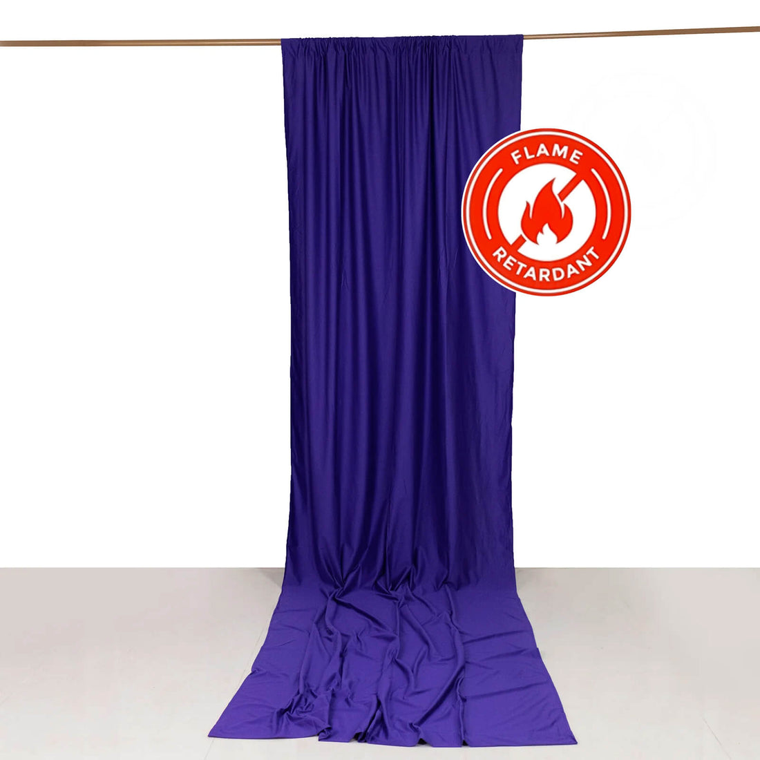 Purple flame-retardant fabric drape hanging from a rod