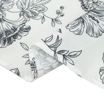 Floral patterned fabric in black and white with folded edge detail