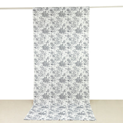 Floral patterned fabric roll on a plain background