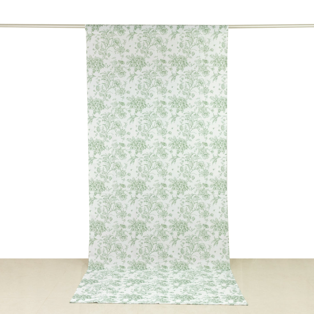 Floral patterned fabric backdrop in green and white design