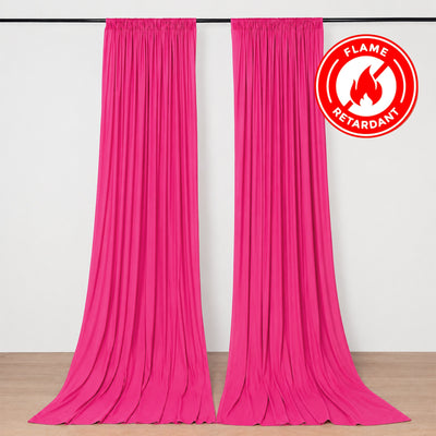 Hot pink flame retardant curtains hanging on a rod in a room
