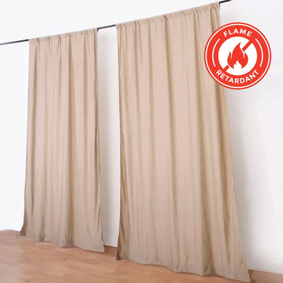 Flame retardant beige curtains displayed in a studio setting.