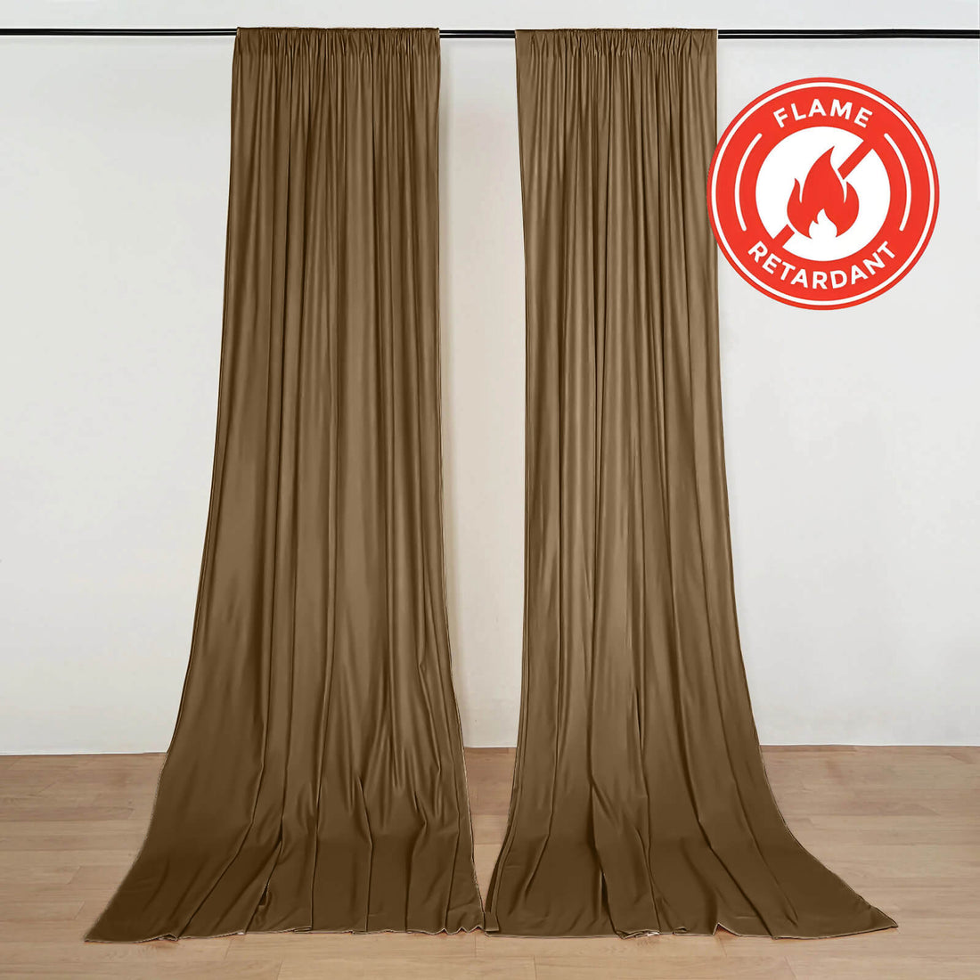Flame retardant brown curtains hanging on a wall with fire-resistant label