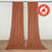 Flame retardant brown curtains hanging on a wall with fire safety label