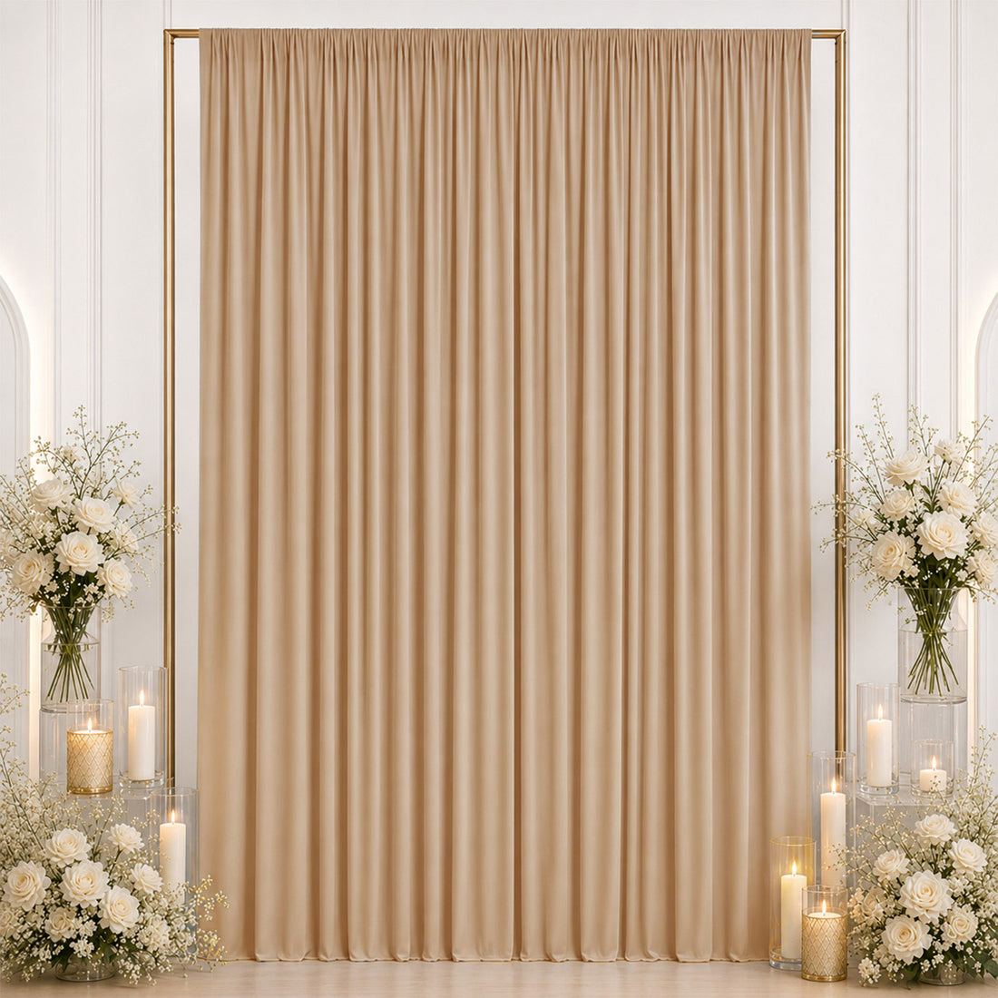 Elegant beige curtain backdrop with white floral arrangements and candles