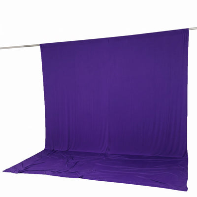 Purple photography backdrop with floor drape and support pole