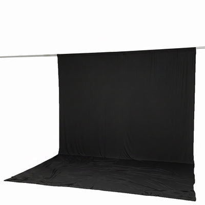 Black photography backdrop on support stand for studio use