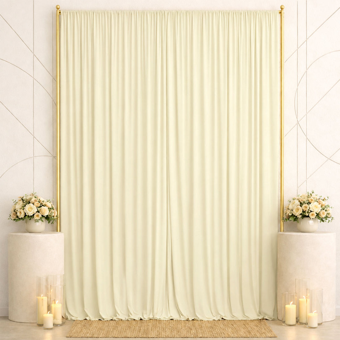 Elegant cream wedding backdrop with gold frame, floral arrangements, and candles