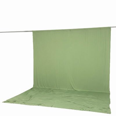 Green backdrop curtain on support rod with floor sweep for photo studio use