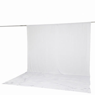 White backdrop curtain with floor sweep on a crossbar stand