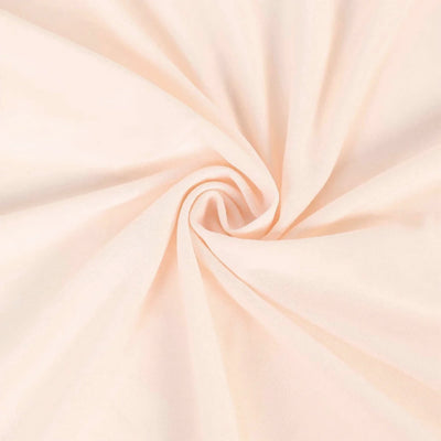 Soft peach fabric swirl abstract background with elegant folds #whtbkgd