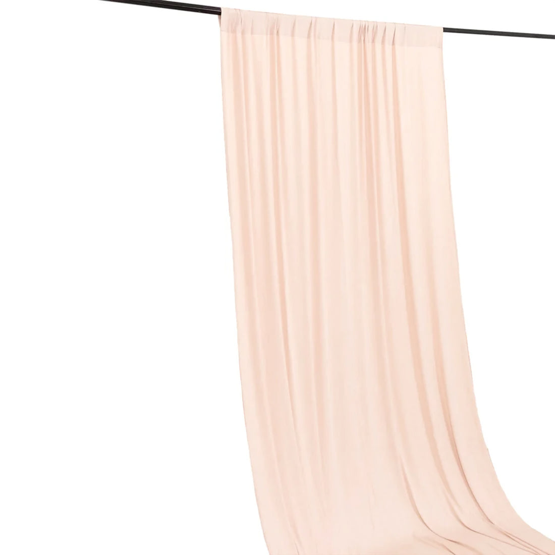 Blush pink sheer curtain panel hanging on a rod