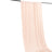 Blush pink sheer curtain panel hanging on a rod