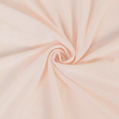 Soft peach fabric swirl texture background with elegant folds #whtbkgd