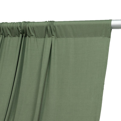 Green curtain panel with gathered top detail