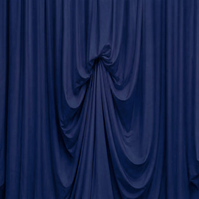 Blue stage curtains with dramatic draped folds and soft shadows
