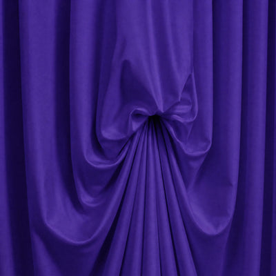 Purple draped fabric backdrop with elegant folds and central knot#whtbkgd