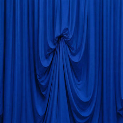 Blue draped fabric background with elegant pleated folds
