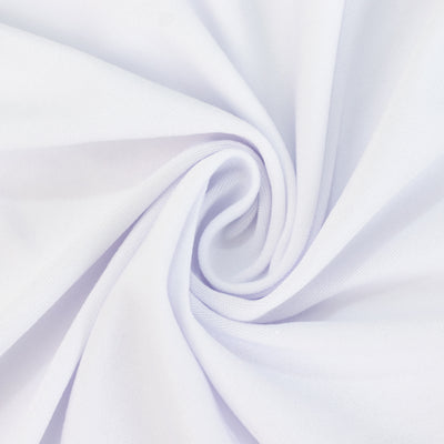 White fabric in a spiral pattern showcasing its texture and softness. #whtbkgd