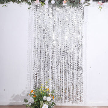 Add a Touch of Elegance to Your Event with the Metallic Silver Wavy Tinsel Streamer Party Backdrop