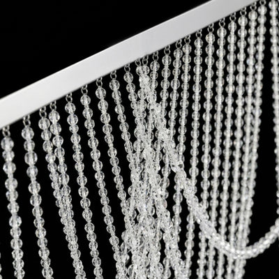 Crystal bead curtain hanging decor on a black background.