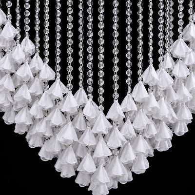 White beaded fringe curtain with crystal strands on black background