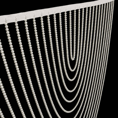 White pearl beaded fringe curtain on black background