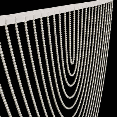 Elegant white pearl beaded curtain strands on a black background