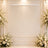 Elegant white floral wedding backdrop with pearl bead drapes and candles
