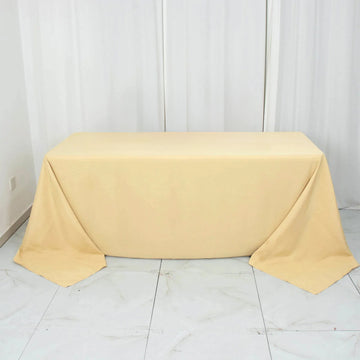 Elevate Your Event with the Champagne Seamless Premium Polyester Rectangular Tablecloth