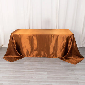 Elevate Your Event with the Cinnamon Brown Satin Seamless Rectangular Tablecloth 90"x132"