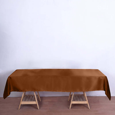Brown tablecloth on a wooden table in a minimalistic setting.