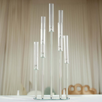 Modern glass candle holder with multiple cylindrical tubes.