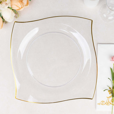 Elegant square glass plate with a gold rim, perfect for dining.