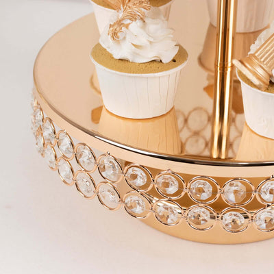 Elegant cupcake stand with crystal accents and gold finish.