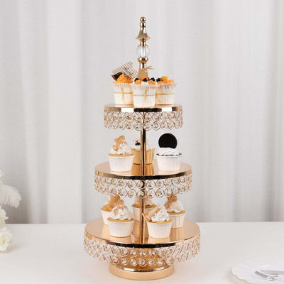 Gold cupcake stand with decorated cupcakes on elegant tiers.
