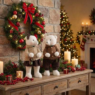 Christmas teddy bears in sweaters with festive wreath and holiday decor on mantel