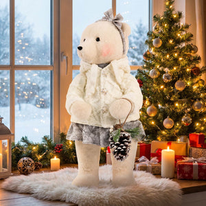 Christmas teddy bear in winter outfit beside decorated tree and gifts