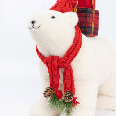 Plush polar bear Christmas decoration with red scarf and gift bag