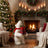Cozy Christmas living room with fireplace, decorated tree, and teddy bear gift</final