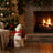 Cozy Christmas fireplace with decorated tree and polar bear holiday decor
