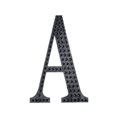 Black letter "A" with textured dots on a plain white background