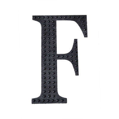 Black textured letter "F" isolated on white background