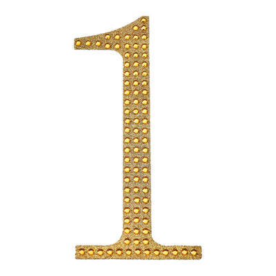 Gold glitter number one with rhinestones on a white background.