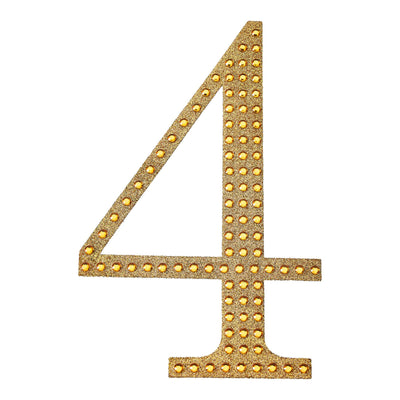 Gold glitter number 4 with LED lights on a white background