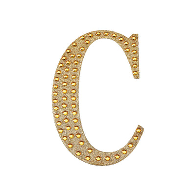 Gold studded letter "C" decorative piece