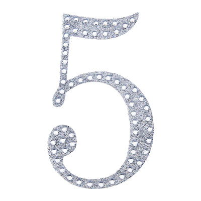 Glittery number 5 in silver on a white background